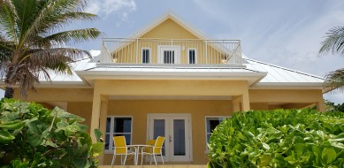 Wrap Around Porch with Out Door Dining and Lounge Chairs